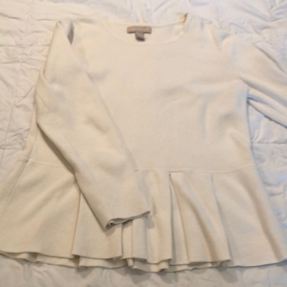 Cream colored peplum sweater